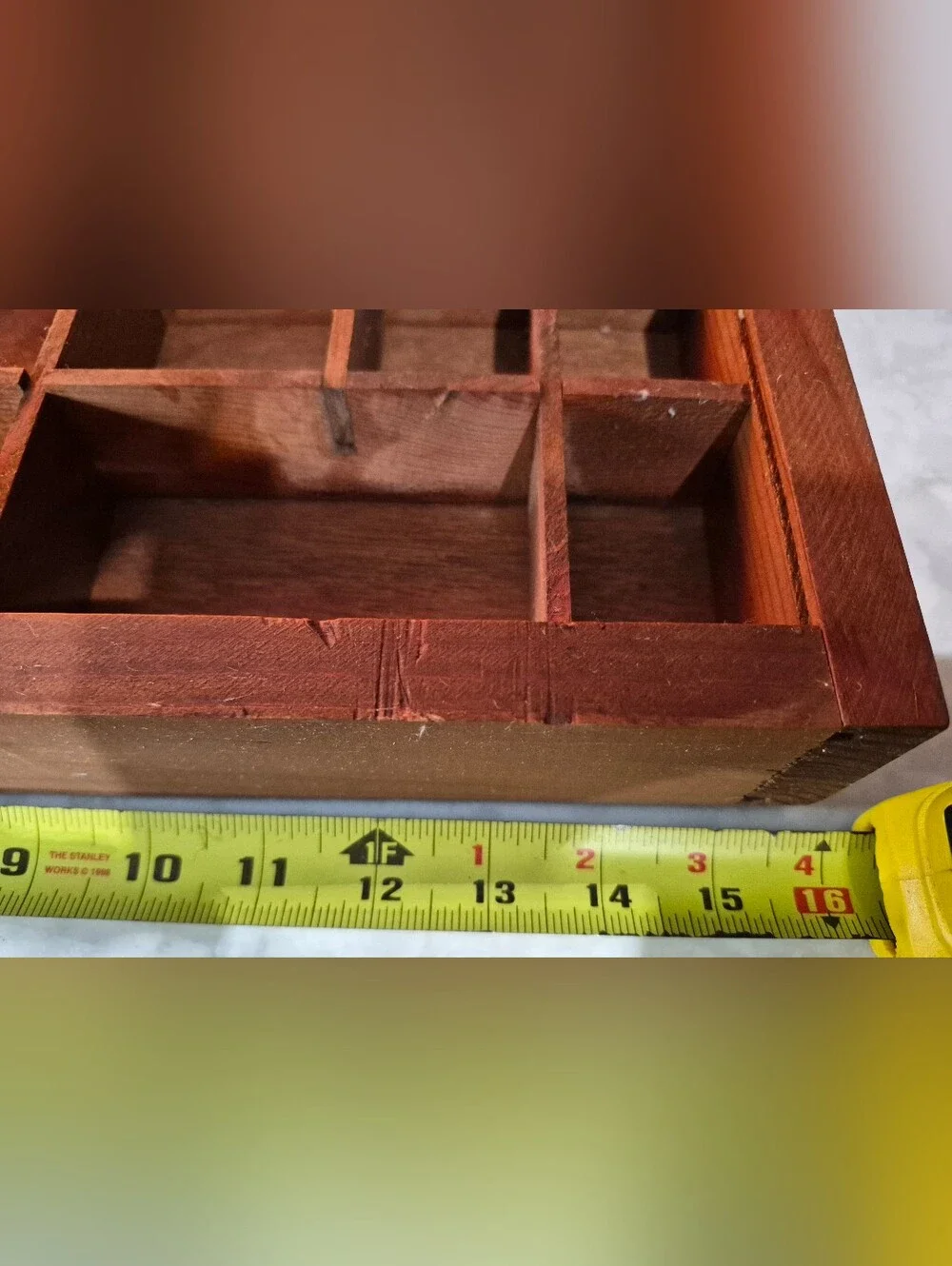 Vintage wooden shadow box features 22 unevenly sized compartments
